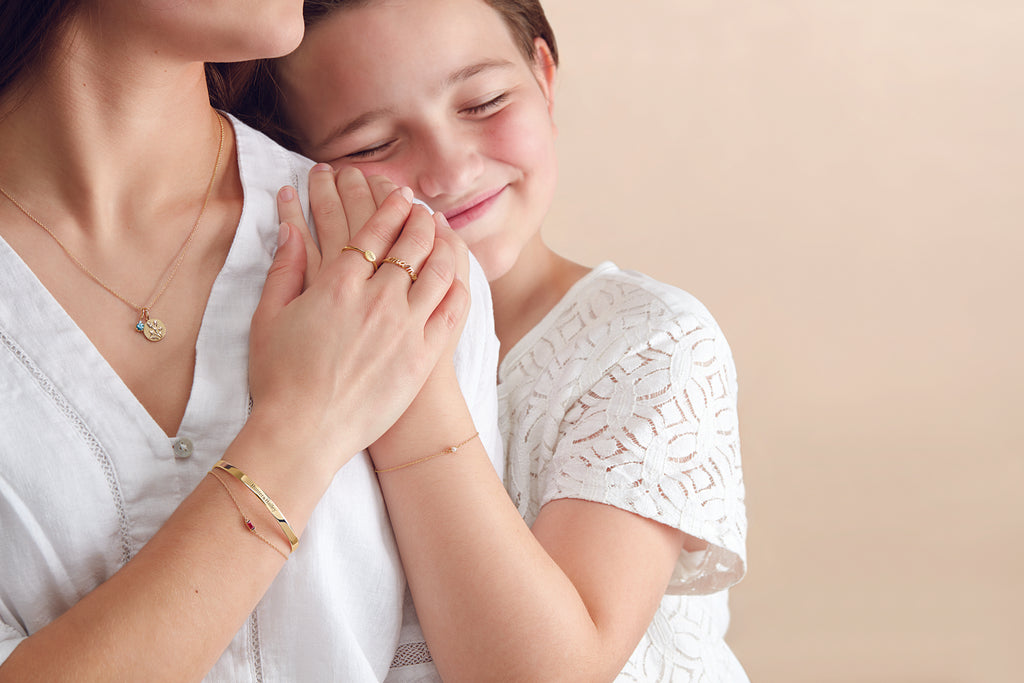 Say Happy Mother's Day With Fine Jewelry Mother and Daughter Embracing