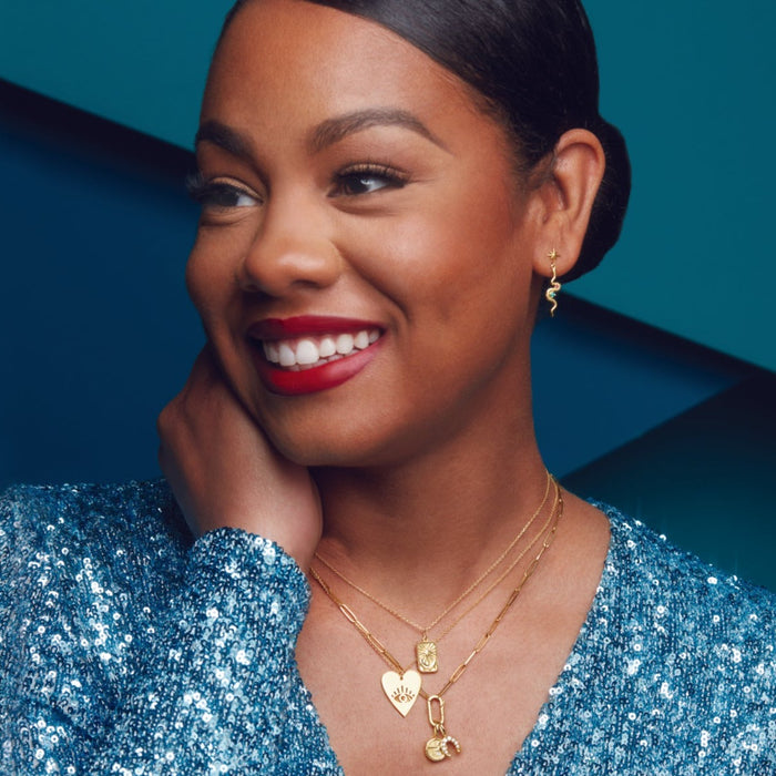 Dressed Up in Sequins Wearing our Celestial Dangle Snake Turquoise Ruby Solid Gold Earrings