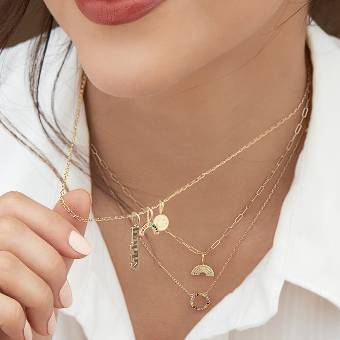 Model wearing Happy, Rainbow and Smiley Face Charm on Figaro Gold Chain