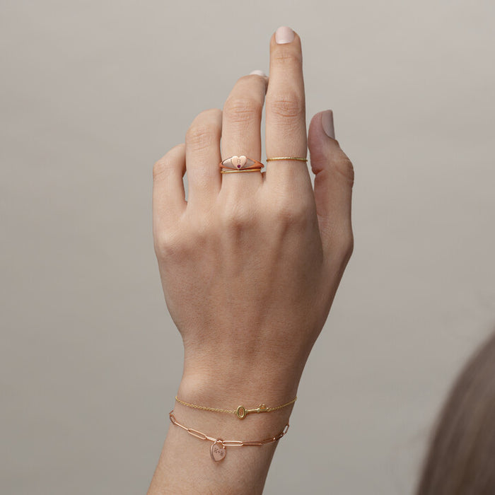 Model wearing 1.0 MM Stackable Ring in 14K Yellow Gold
