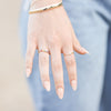 Model wearing half round 6 MM bangle in 14K Yellow Gold Storyteller by Vintage Magnality