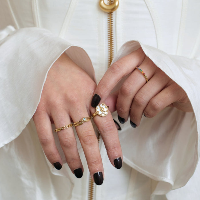 Model wearing Stacking Rings with Gemstone Rainbow Stacking Band