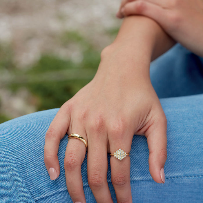 Model wearing our Petite 4 MM Dome Wear Everyday™ Ring in Solid 14K Yellow Gold 