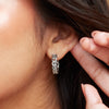 Model wearing our Chain Link Wear Everyday® Hoop Earrings in Solid 14K White Gold