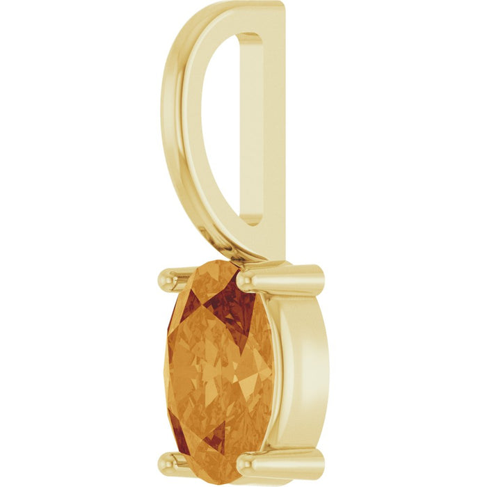 Gold pendant with a citrine gemstone on a white background