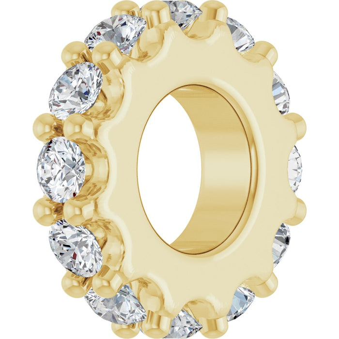 Gold charm with diamond gemstones on a white background