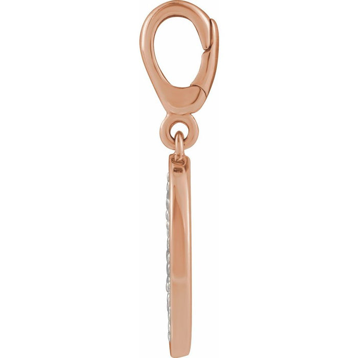 Rose gold diamond charm pendant with a clasp on a white background