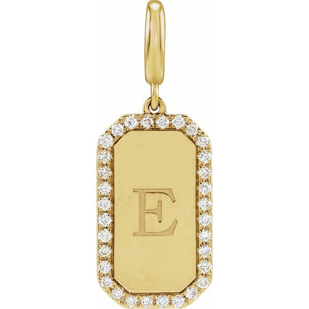 Gold dog tag charm pendant with 'E' and diamond accents on a white background
