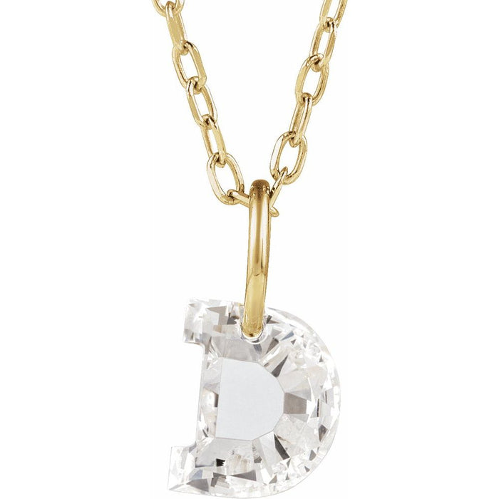 Gold necklace with a floating diamond d initial on a white background