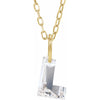 Gold necklace with a floating diamond L initial on a white background
