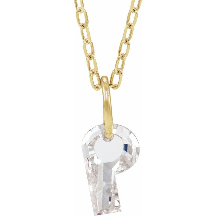 Gold necklace with a floating diamond p initial on a white background