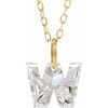 Gold necklace with a floating diamond w initial pendant on a white background