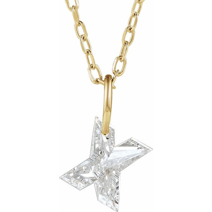Gold necklace with a floating diamond x initial pendant on a white background