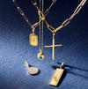 Gold necklaces with various charm pendants on a blue background