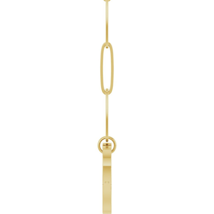 Side view of paperclip yellow gold necklace with a heart shaped bail  on a white background