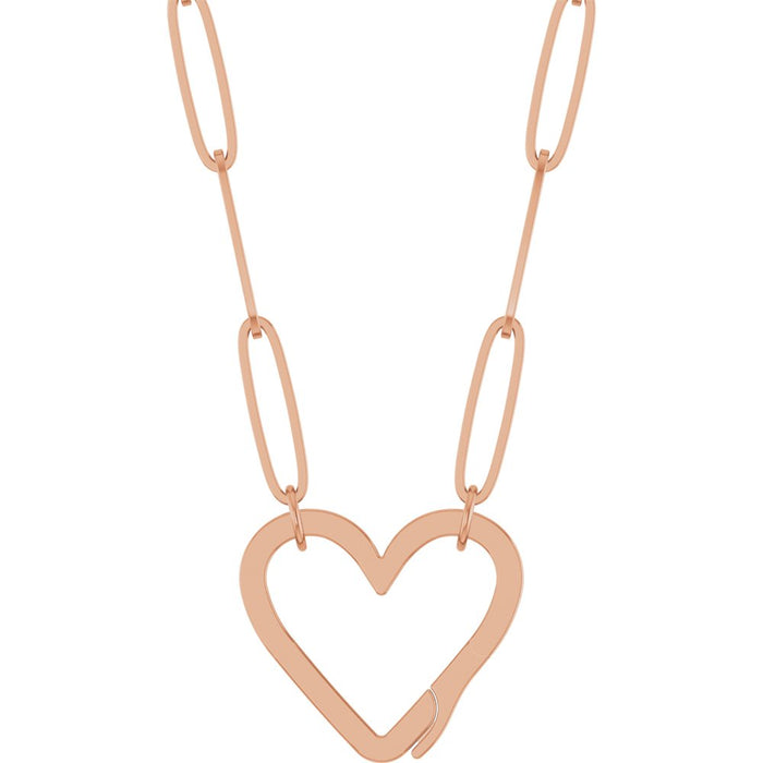 A rose gold paperclip chain necklace featuring a large, open heart-shaped bail pendant suspended from elongated oval links on a plain white background.