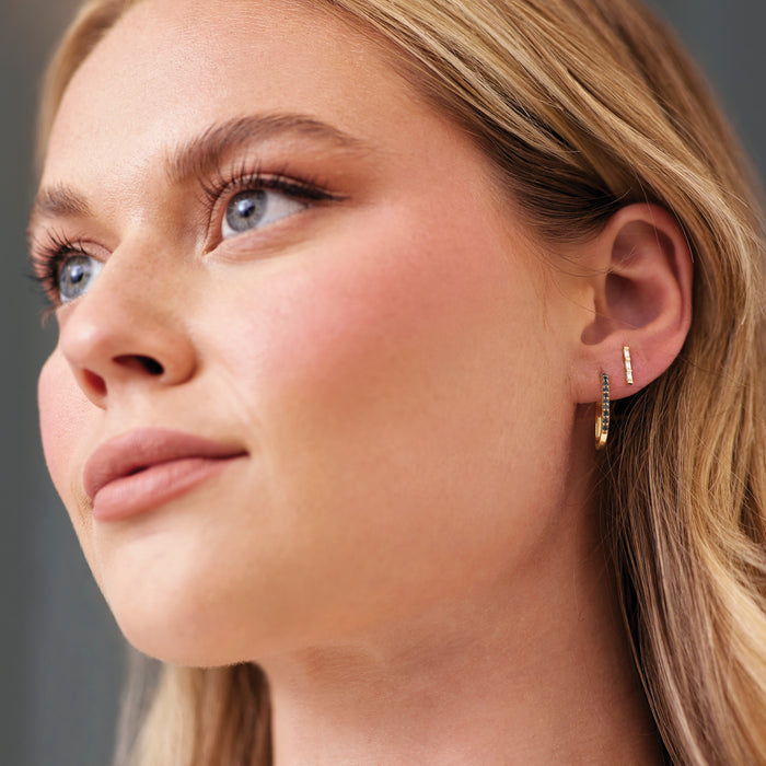 Model wearing our Three Stone Natural Diamond Bar Earrings in Solid 14K Yellow Gold 