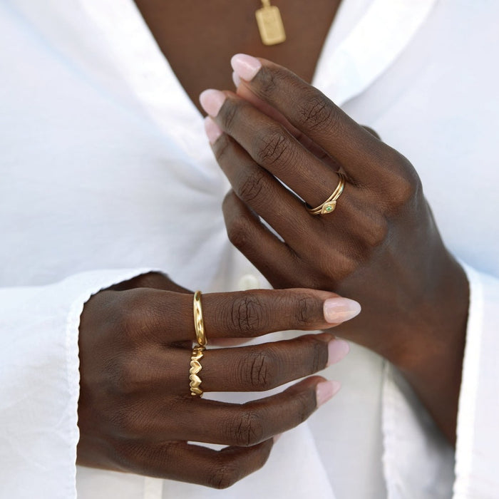 Model wearing our Hearts on Hearts Ring in Solid 14K Yellow Gold 