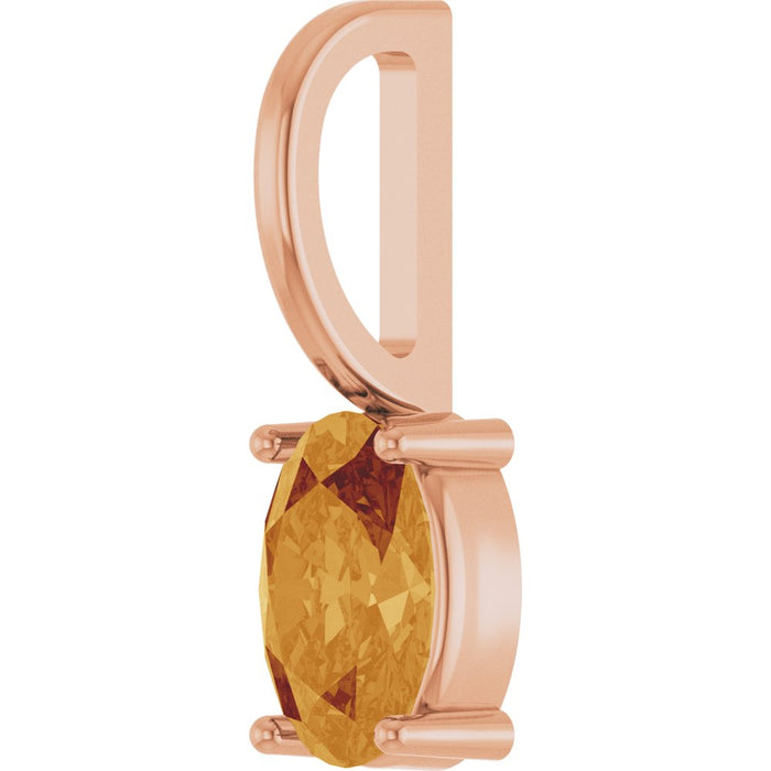 A rose gold pendant featuring a faceted oval-cut citrine gemstone in a prong setting