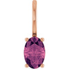 Rose gold pendant with a pink tourmaline gemstone on a white background
