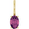 Yellow gold pendant with a pink tourmaline gemstone on a white background