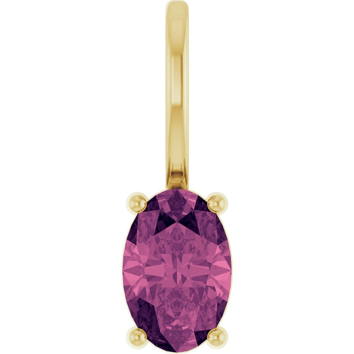 Yellow gold pendant with a pink tourmaline gemstone on a white background