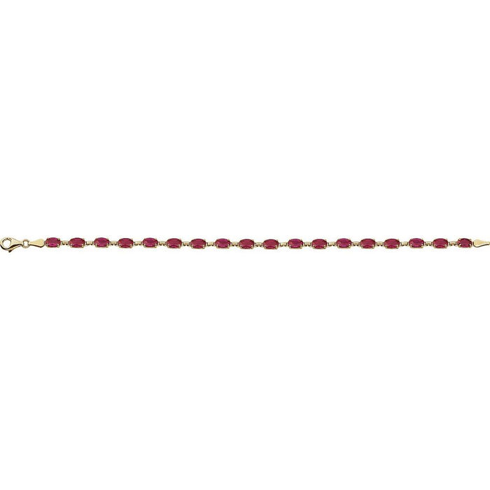 A gold tennis bracelet featuring a row of small oval-cut deep red ruby gemstones, displayed horizontally against a solid white background.