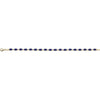 A gold tennis bracelet featuring a row of oval-cut dark blue sapphires, displayed horizontally against a solid white background.