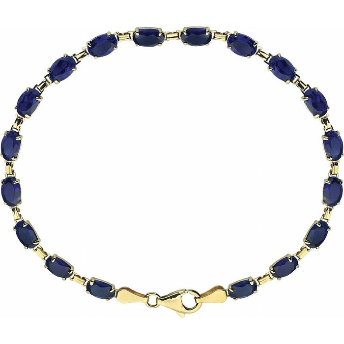A yellow gold tennis bracelet featuring oval-cut dark blue gemstones, arranged in a circular shape on a plain white background.