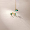 Emerald pendant gold necklace with emerald diamond halo stud earrings 