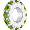 White gold charm with light green gemstones on a white background