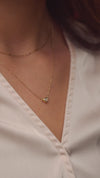 Video of Model Wearing our Heart Shape Bezel-Set Diamond Solitaire Adjustable Necklace in Solid 14K Gold