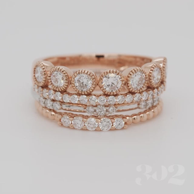 The perfect diamond ring stack featuring our Swoon Worthy 1 CTW Diamond Ring on top, with two of our other rings below