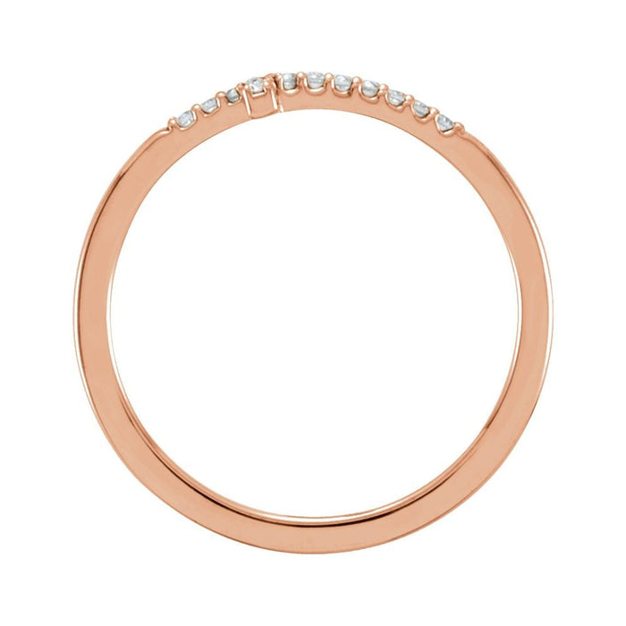 Side view of diamond sideways cross ring rose gold with white background