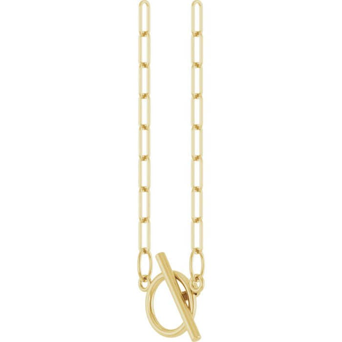Yellow gold toggle charm necklace with paperclip style chain at a side angle