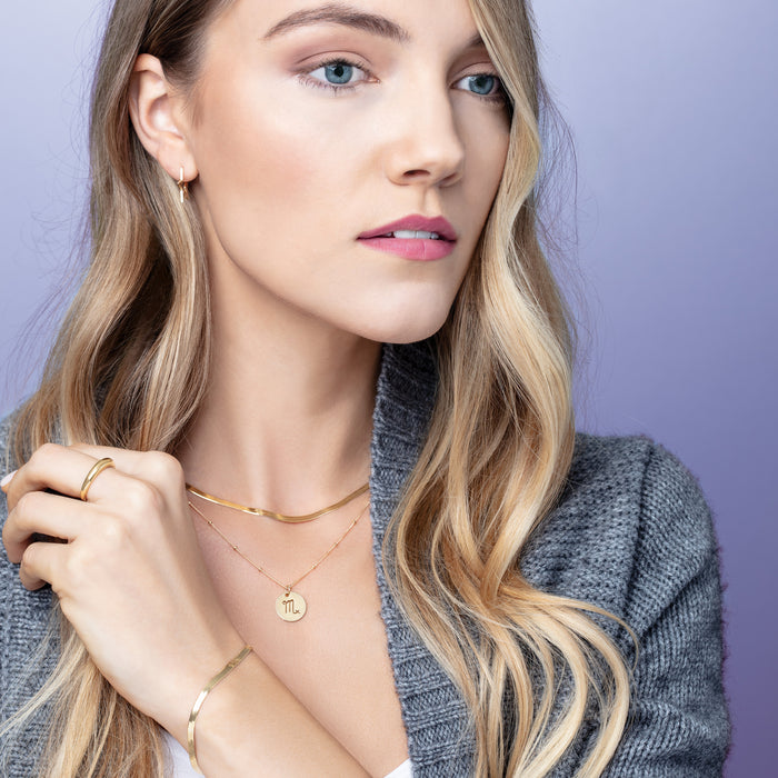 Model wearing both the 16" necklace 2.8 MM flexible herringbone  as well as 7" herringbone bracelet 