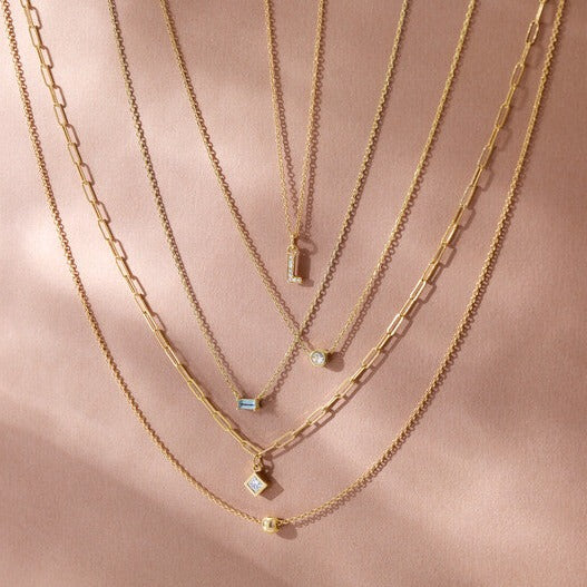 Our Micro Bezel-Set 18" Necklace Shown Here with other necklaces