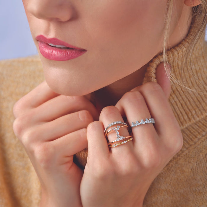 Model wearing 1/10 CTW Diamond Stackable Ring in 14K Yellow Gold 