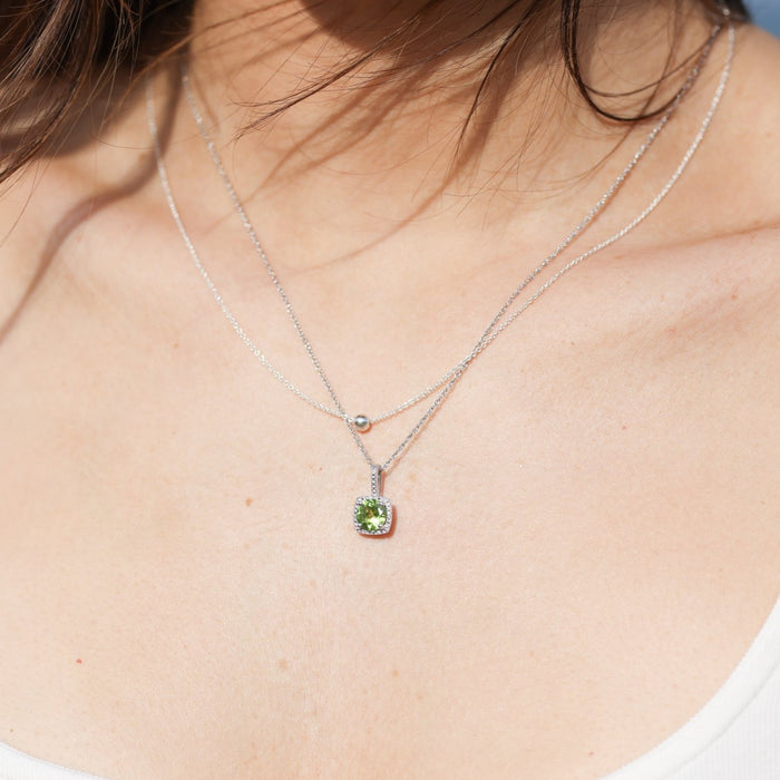 Model is wearing Peridot & Diamond Sterling Silver 18" Necklace Storyteller by Vintage Magnality