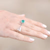Model wearing lab-grown emerald and diamond ring Storyteller by Vintage Magnality