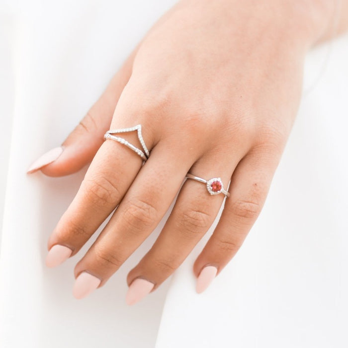 Model is wearing Ruby and Diamond Birthstone Ring