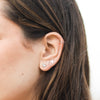 Model wearing star stud earring in 14K White Gold Storyteller by VIntage Magnality