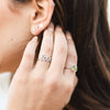 Model wearing Peridot & Diamond Silver Ring by Storyteller by Vintage Magnality