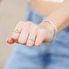 Model wearing Peridot & Diamond Silver Ring by Storyteller by Vintage Magnality