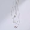 Halo Style Pearl and Diamond Necklace