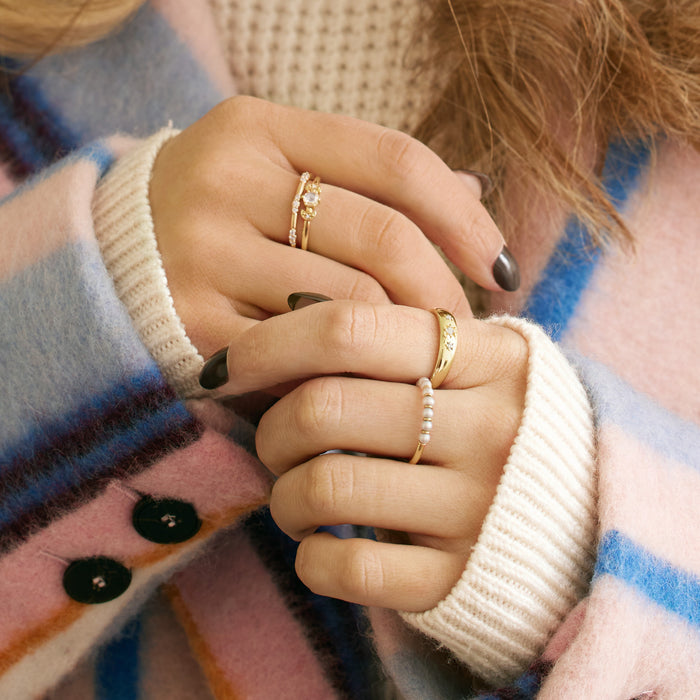 Model wearing our Modern Freshwater Cultured Pearl Ring in Solid 14K Yellow Gold