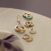 A collection of 14K Yellow Gold Hoop earrings 