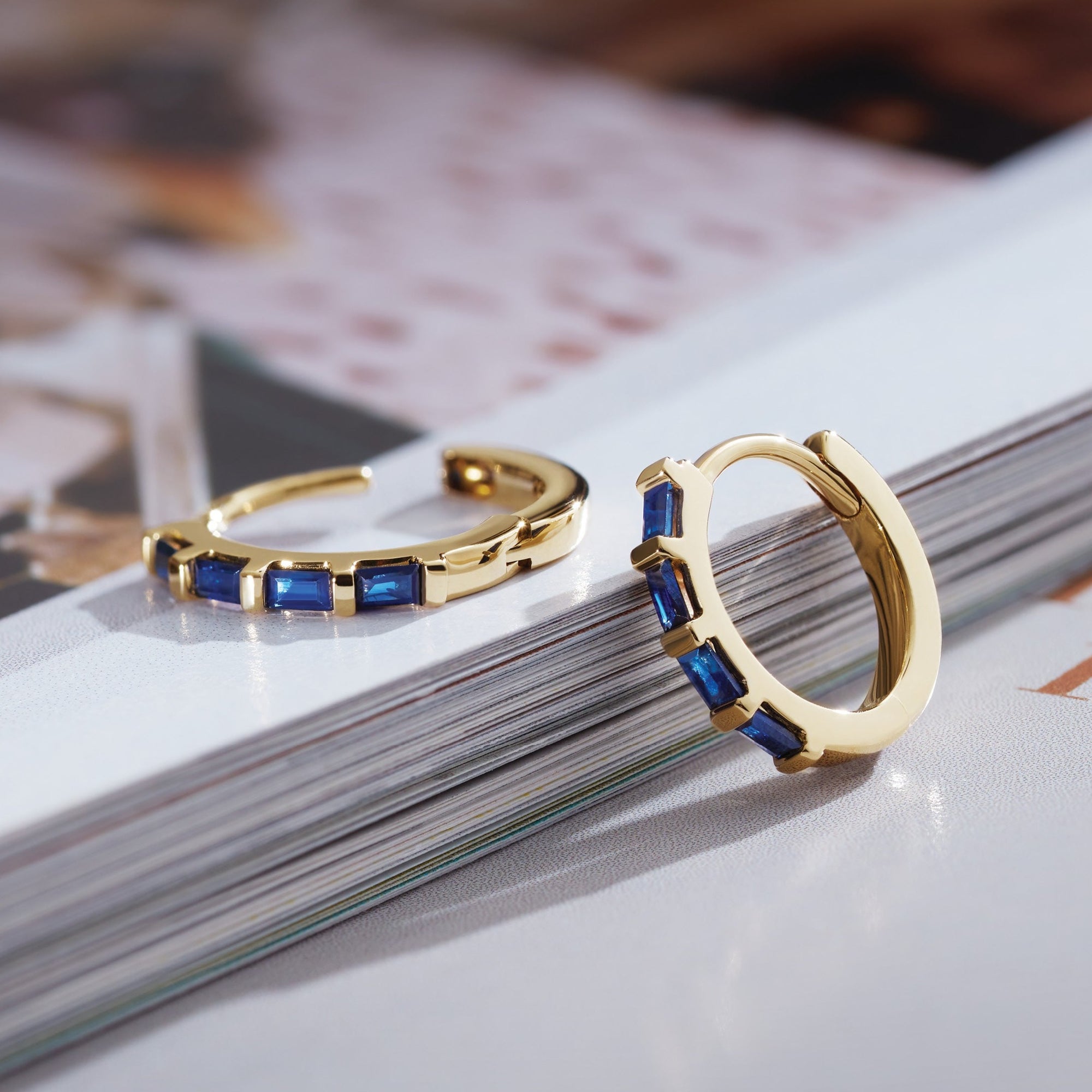 Our Natural Blue Sapphire Hinged Huggie Hoop Earrings in 14K Yellow Gold