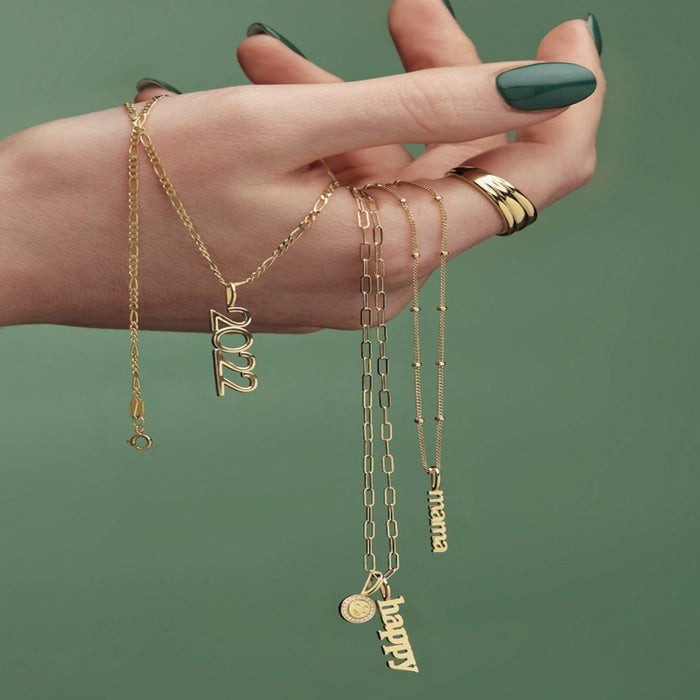 Holiday gifts featuring our Happy Vertical Charm Pendant in 14K Yellow Gold 