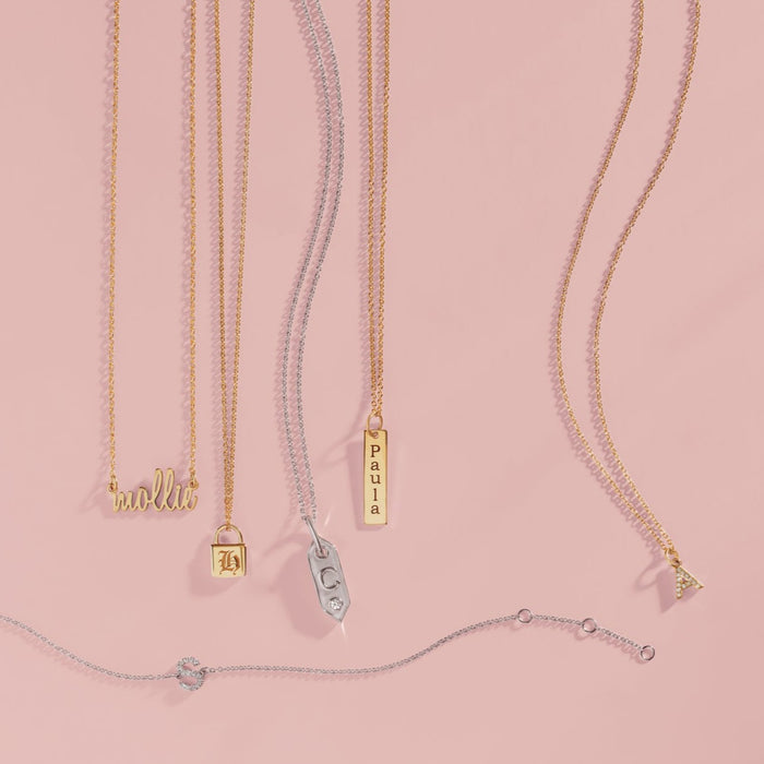 Initial Jewelry Necklaces and Bracelet Featuring our Petite Initial Natural Diamond Adjustable Necklace in solid 14K Yellow Gold